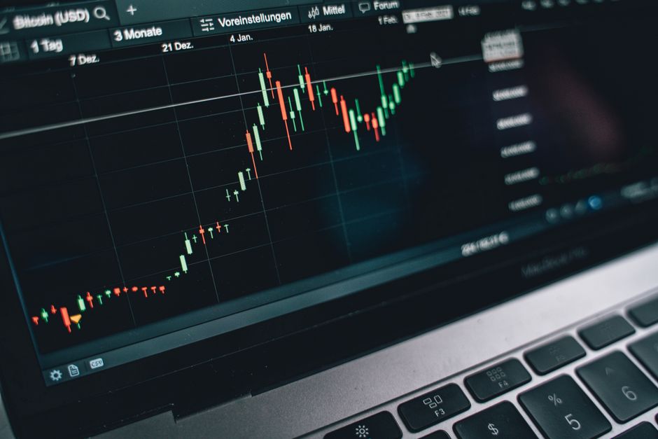 Close-up of a computer screen displaying cryptocurrency market trends and data to show crypto prop firm trading 2026